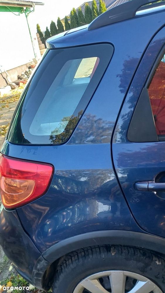 BŁOTNIK TYLNY PRAWY SUZUKI SX4 ZCH