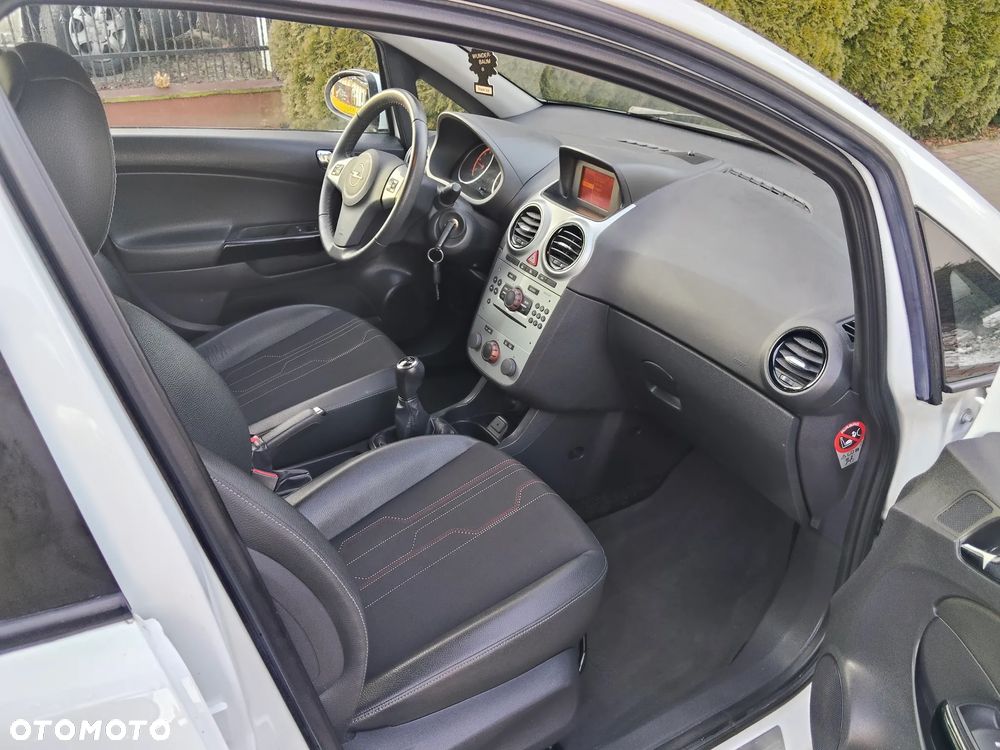 Opel Corsa 1.2 16V Enjoy - 23