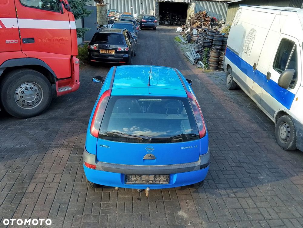 Opel Corsa C (02r.) 1.2 B 74KM. Silnik Z12XE Skrzynia F13BY lakier 20U.Cały na części. GWARANCJA !!! Przód Tył Zestaw Komplet Drzwi Klapa Zderzak Błotnik Maska Grill Atrapa Szyba Pas Lampa Lusterko Boczki Fotel Kanapa Kokpit Deska Rozdzielcza Przełącznik Włącznik Sterownik Przewody Wiązka Instalacja Moduł Komputer Czujnik Listwa Pompa Alternator Wtryski Głowica Rozrusznik Kompresor Sprzęgło Dwumas Silnik Skrzynia ABS Klimatyzacji Paliwa Wspomagania Kolektor Turbina Przepustnica Zawór Chłodnica Koło Hak Belka Sanki Zawieszenie Mcpherson Półoś Amortyzator Wydech Tłumik Zacisk Most - 3
