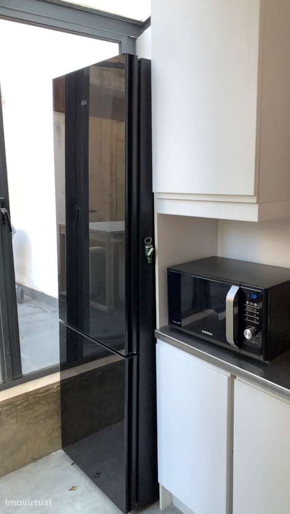 Apartamento T1 com varanda, terraço e móveis incluídos - Grande imagem: 5/10