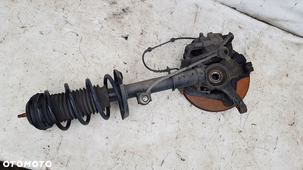 zwrotnica amortyzator lewa przód Opel Adam 1.4 - 5