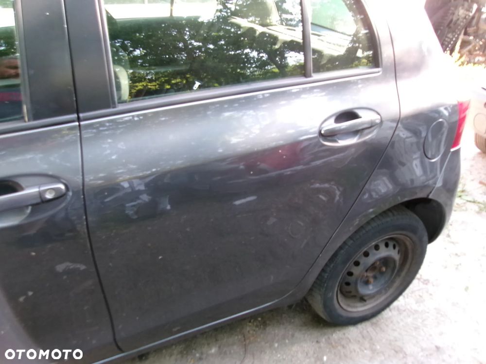 DRZWI LEWE TYLNE  TOYOTA YARIS II 1G3 - 1
