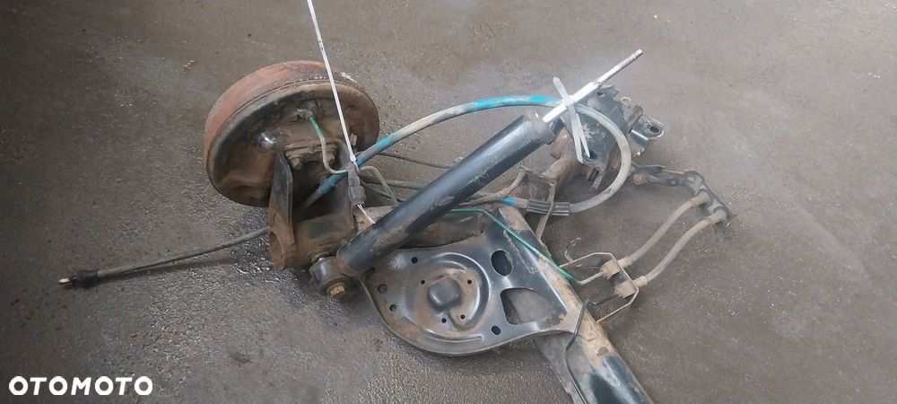 BELKA OŚ ZAWIESZENIA TYŁ BĘBNY Z ABS RENAULT CLIO III 1.5 DCI - 2