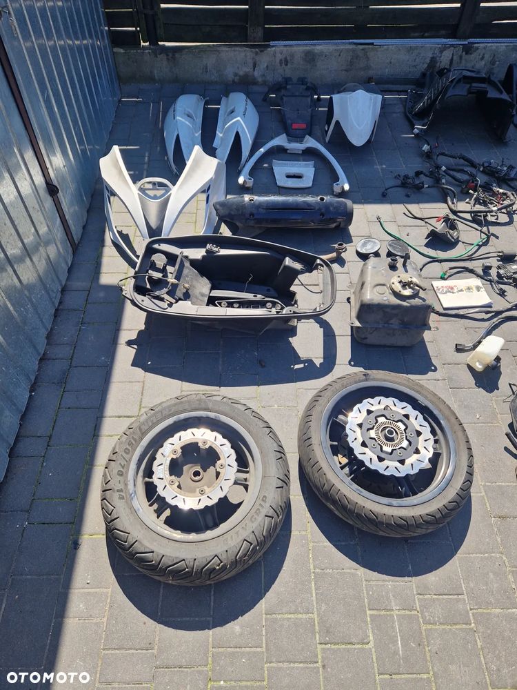 Zawieszenie hamulce koła Kymco Xciting 300r - 11