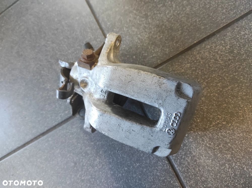 ZACISK TYŁ TYLNY LEWY AUDI A3 S3 8L VW GOLF 4 GTI BORA SKODA OCTAVIA 1 VRS SEAT LOEN 1 CUPRA TOLEDO 2 SPRAWNY GWARANCJA WYSYŁKA !!!!! - 1