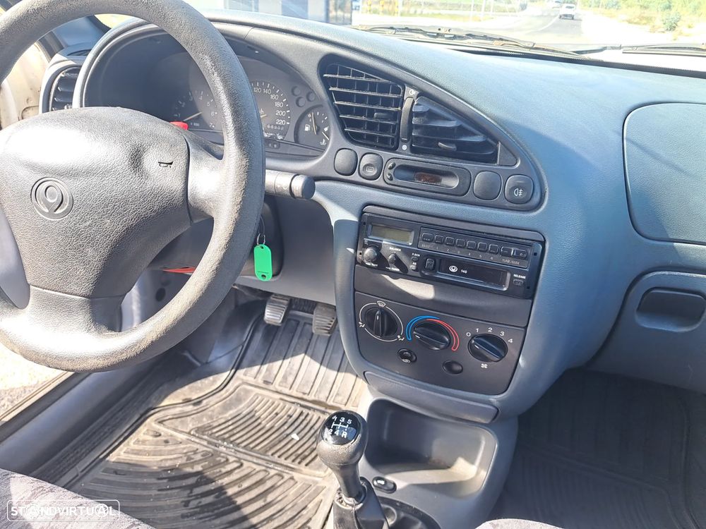 Mazda 121 1.25 - 27