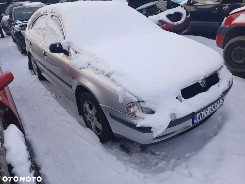 skoda octavia I fotel kanapa deska kokpit podsufitka boczek podłokietnik licznik panel - 1