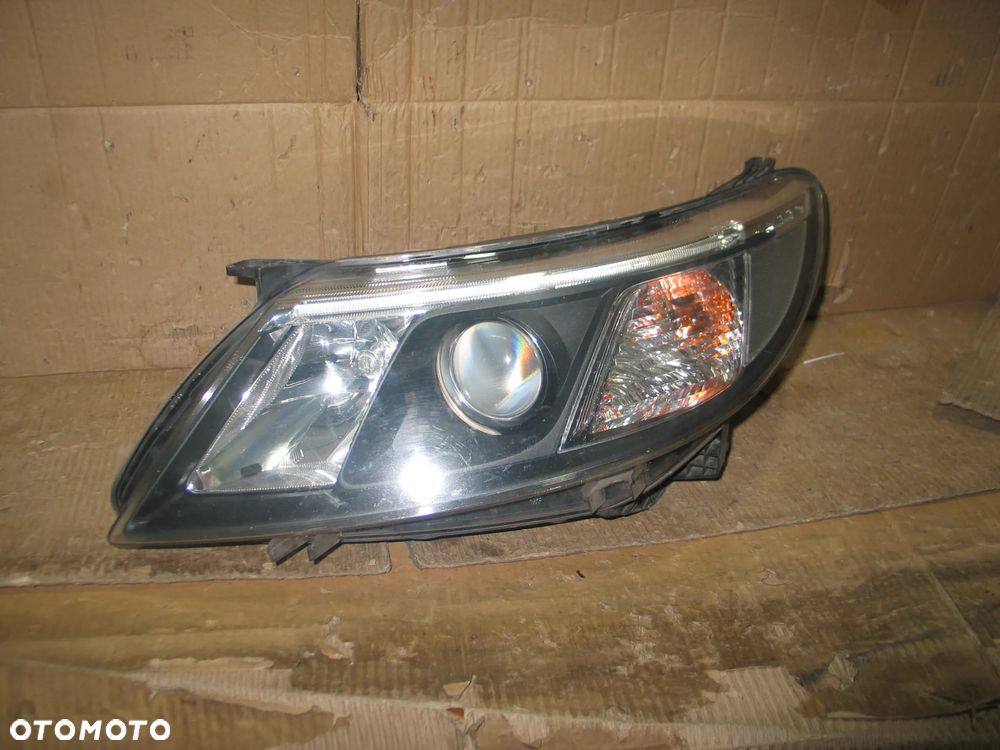 lampa xenon przod saab 93 9-3 2 II lift 07-14r. oryginal europa - 1