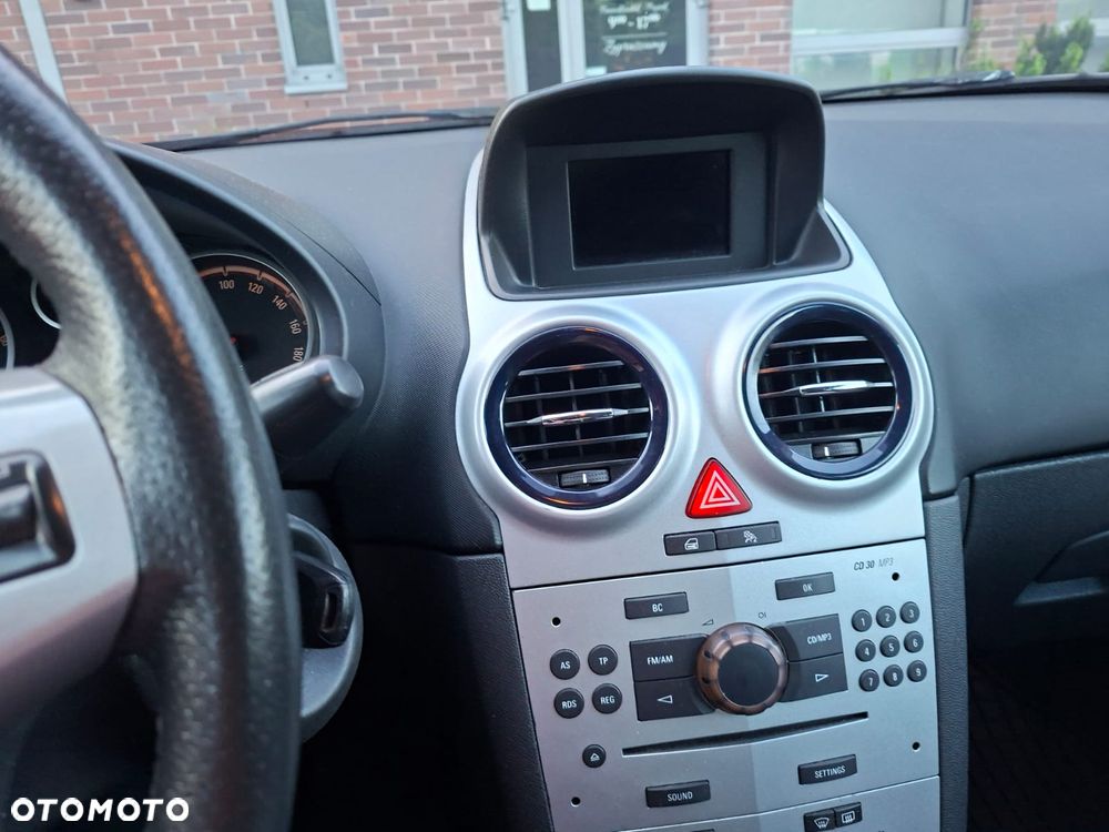 Opel Corsa 1.4 16V Sport - 4