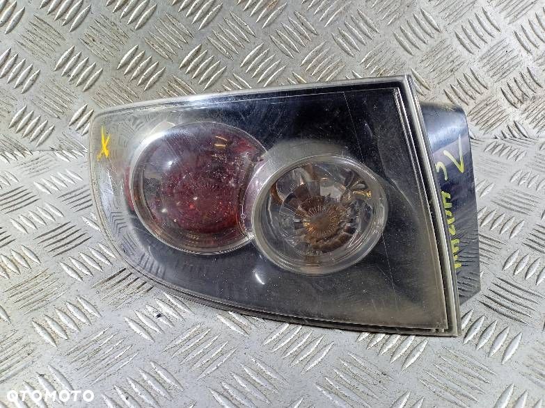 LAMPA LEWA TYLNA MAZDA 3 - 1