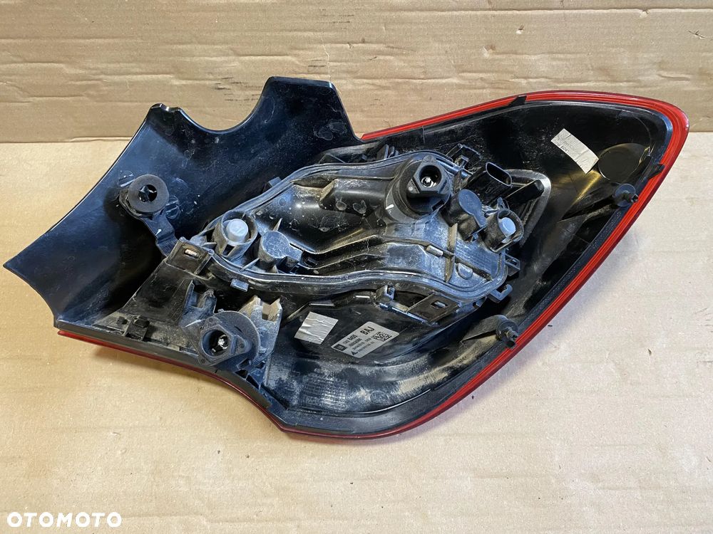 Lampa Opel Corsa E 3d lewa OE - 3
