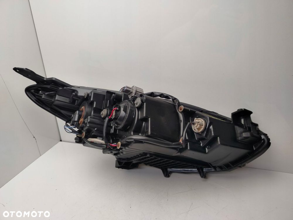 mazda 2 de 2011r reflektor lampa lewy przód lewa przednia soczewka - 11