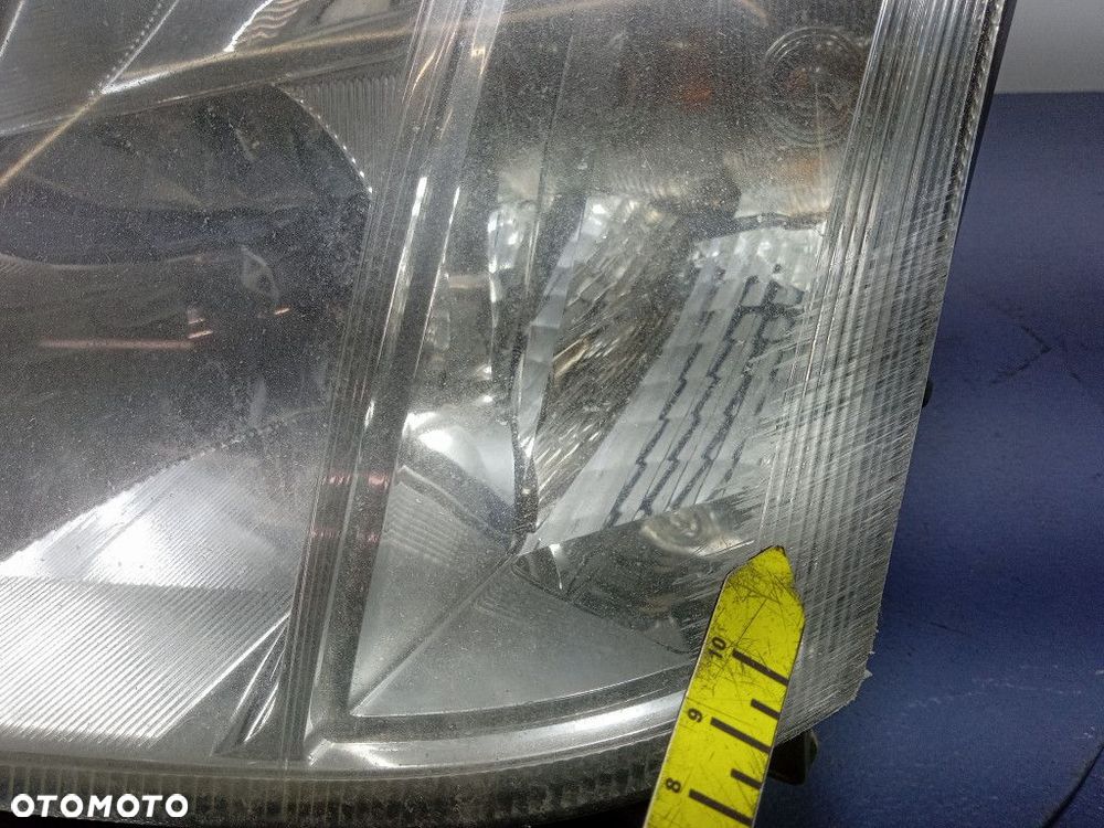 OPEL MERIVA A REFLEKTOR LEWY LAMPA EU 93321052 - 8