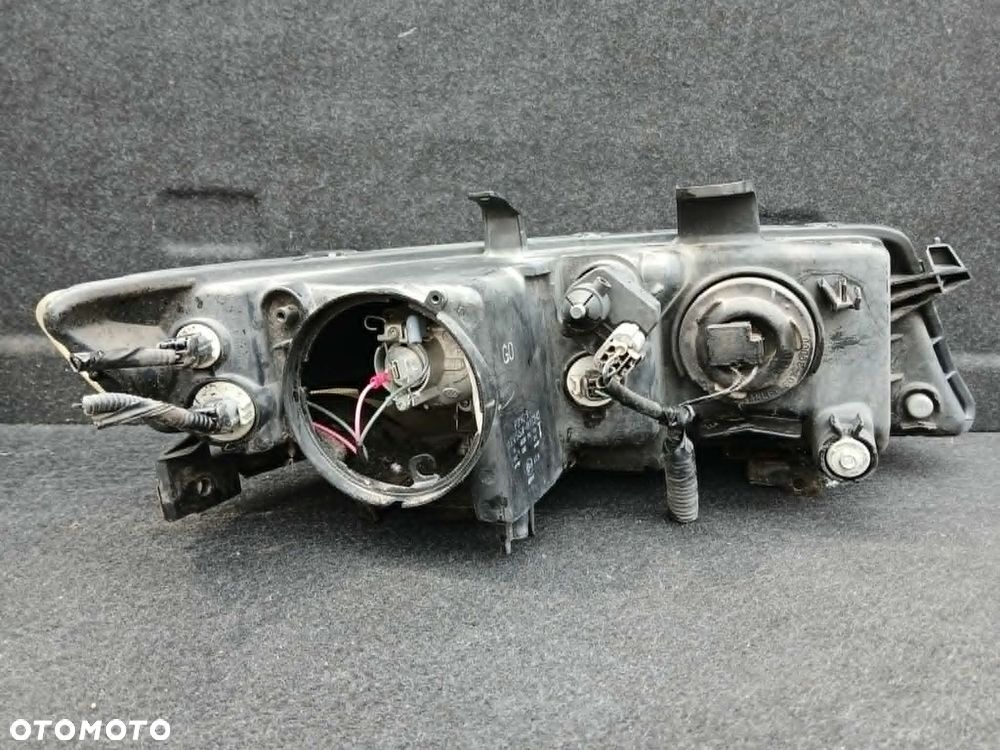 Honda Accord VII lampa przednia lewa - 4