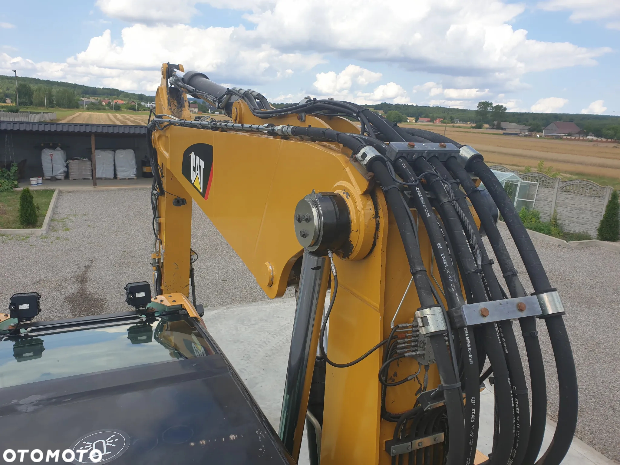 Caterpillar M 318 F ROTOTILT SPROWADZONY ŁADNY STAN - 21