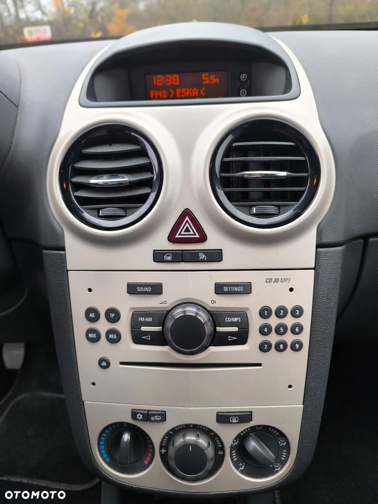 Opel Corsa 1.4 16V Enjoy - 23