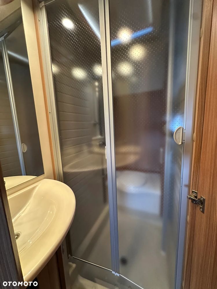 Burstner AVERSO 465 TS FIFTY z napędem i markizą pompowaną. - 39