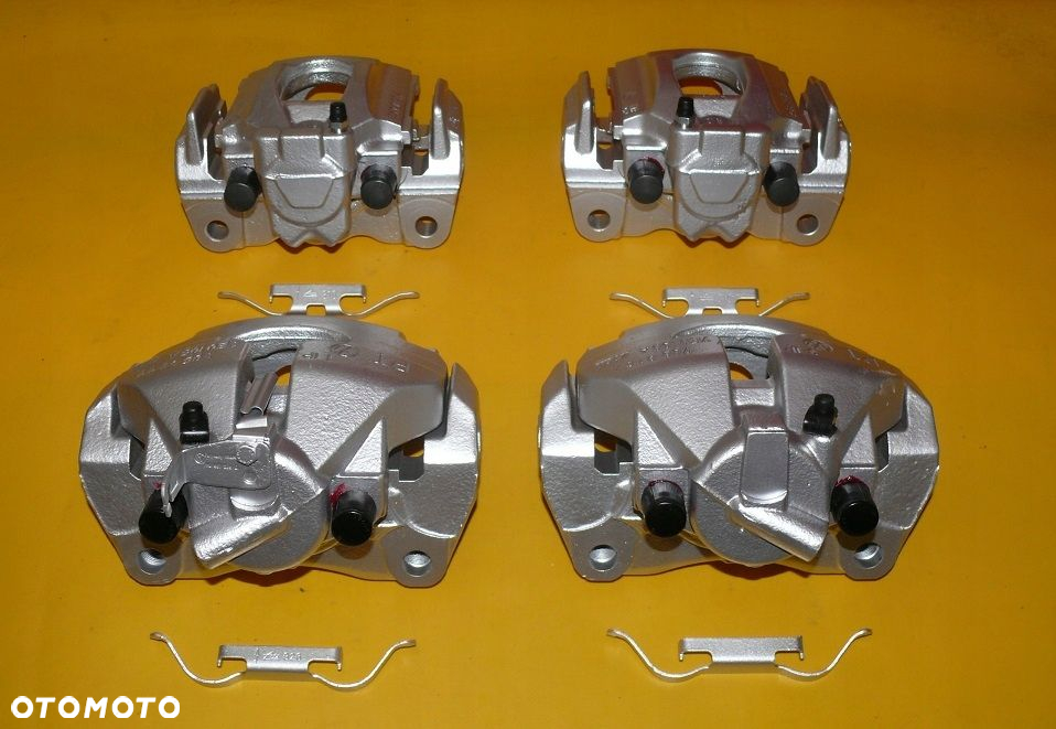 ZACISKI LEWY PRAWY PRZÓD TYŁ VW T5 308/29,5 314/22 - 6