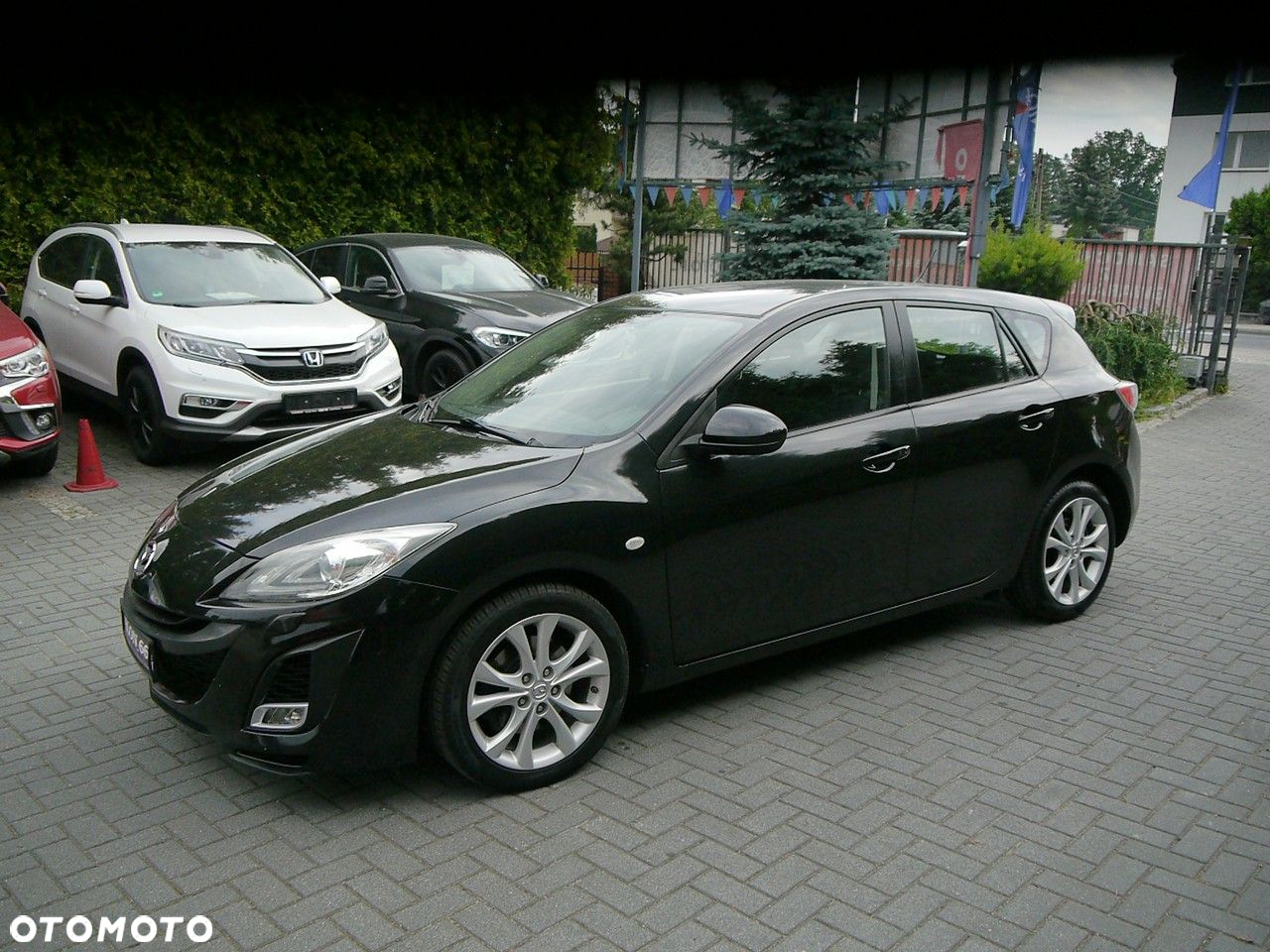Mazda 3 2.0 Exclusive + - 12