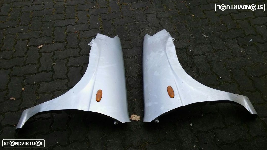 Guarda lamas condutor mazda demio - 1