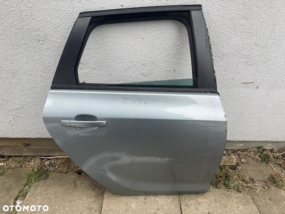 Opel Astra J IV KOMBI drzwi tylne tył prawe Z179