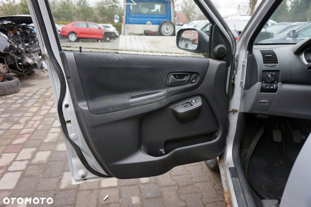 DRZWI PRZEDNIE LEWE IGNIS II Z2S  SREBRNY SUZUKI 2003-2011 - 9