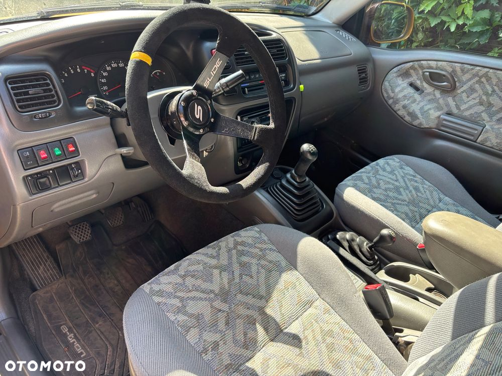 Suzuki Grand Vitara 2.0 - 7