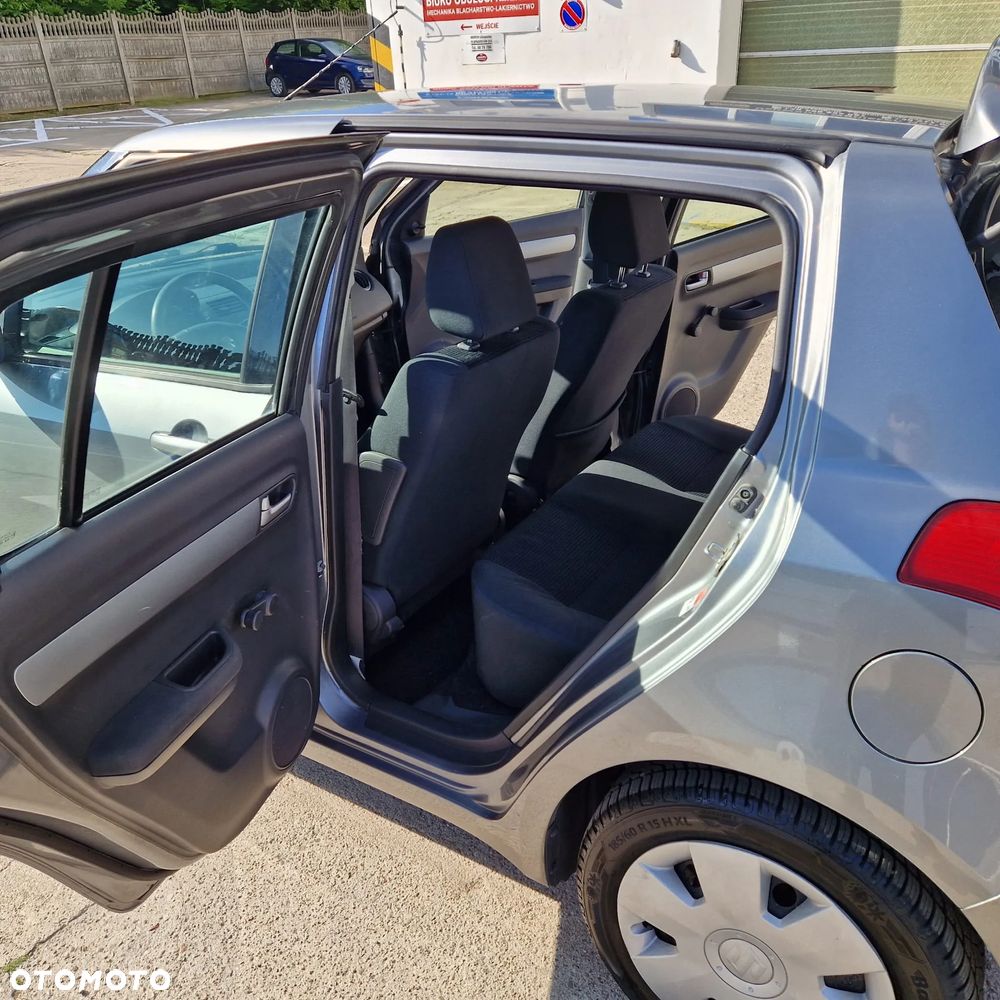 Suzuki Swift 1.3 Club - 11