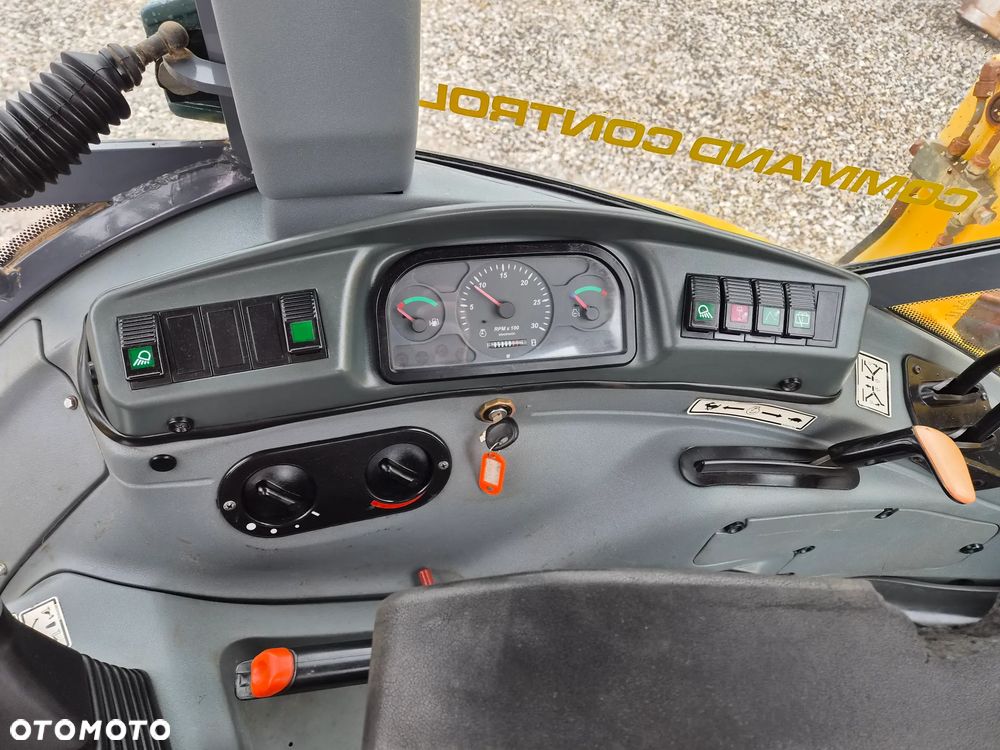 New Holland LB 115 - 11