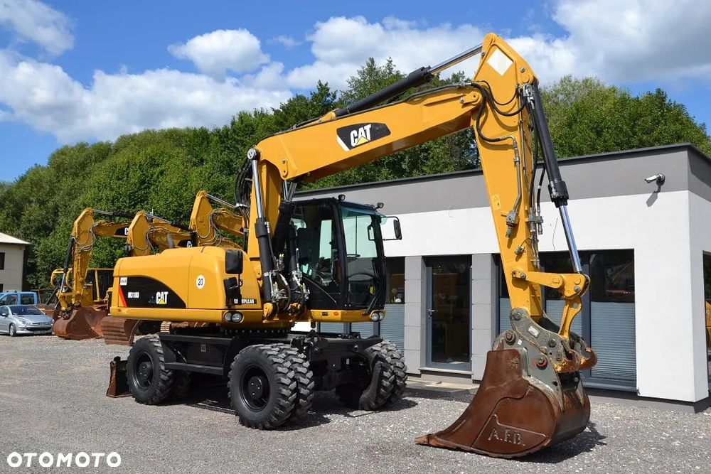 Caterpillar 318 D - 14