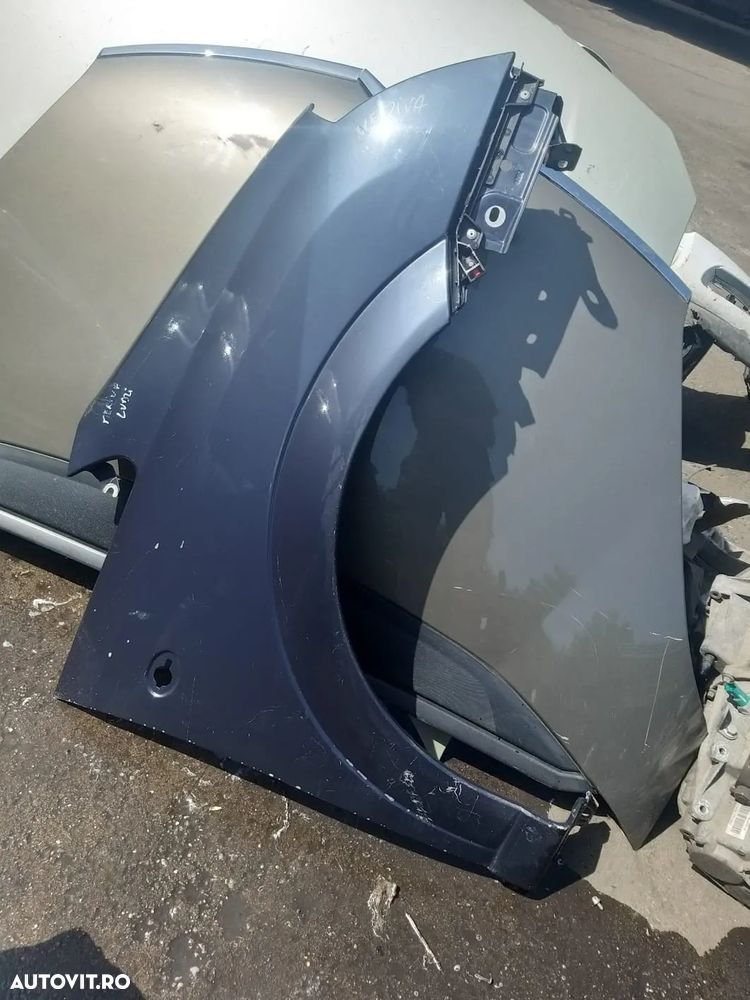Aripa pentru Opel Meriva 2004 - 1