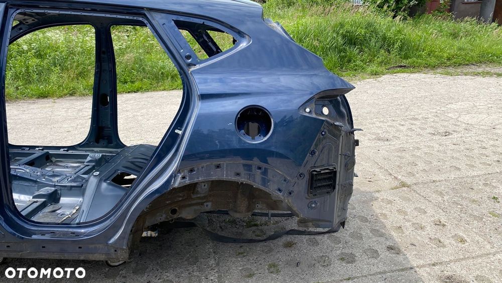 HYUNDAI TUCSON II III ĆWIARTKA BŁOTNIK LEWY TYŁ TYLNY LEWA SG5 15-18 - 2