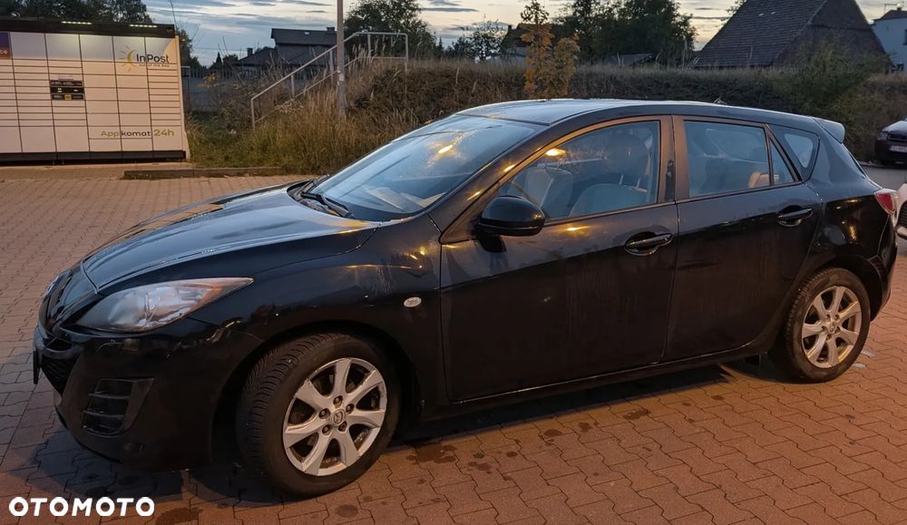 Mazda 3 2009 photo 3
