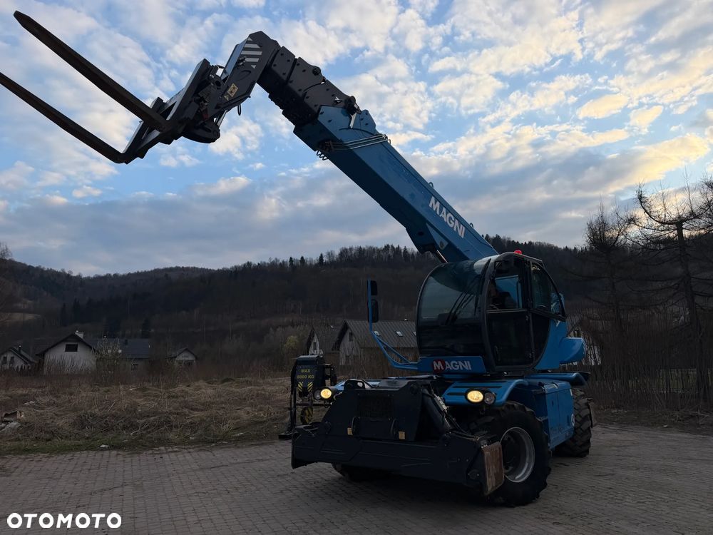 Magni RTH 6.30 SH-M/C . Ładowarka Teleskopowa Dźwig Zwyżka 30 metrów wysuw . Udźwig 6 ton. 4391 mtg Kosz (Pilot 2 funkcje) Wciągarka hydr. Widły. Jak Nowa z Norwegii! 2018rok. KLIMA Webasto post. Aktualna DEKRA 2026r. skręt 4 koła KRAB. Auto-poziomowanie! Zero luzów wycieków jak Nowa z salonu. Pełny Obrót. Małe Gabaryty maszyny. Mała waga 21 ton a potężny zasięg i udzwig! - 38