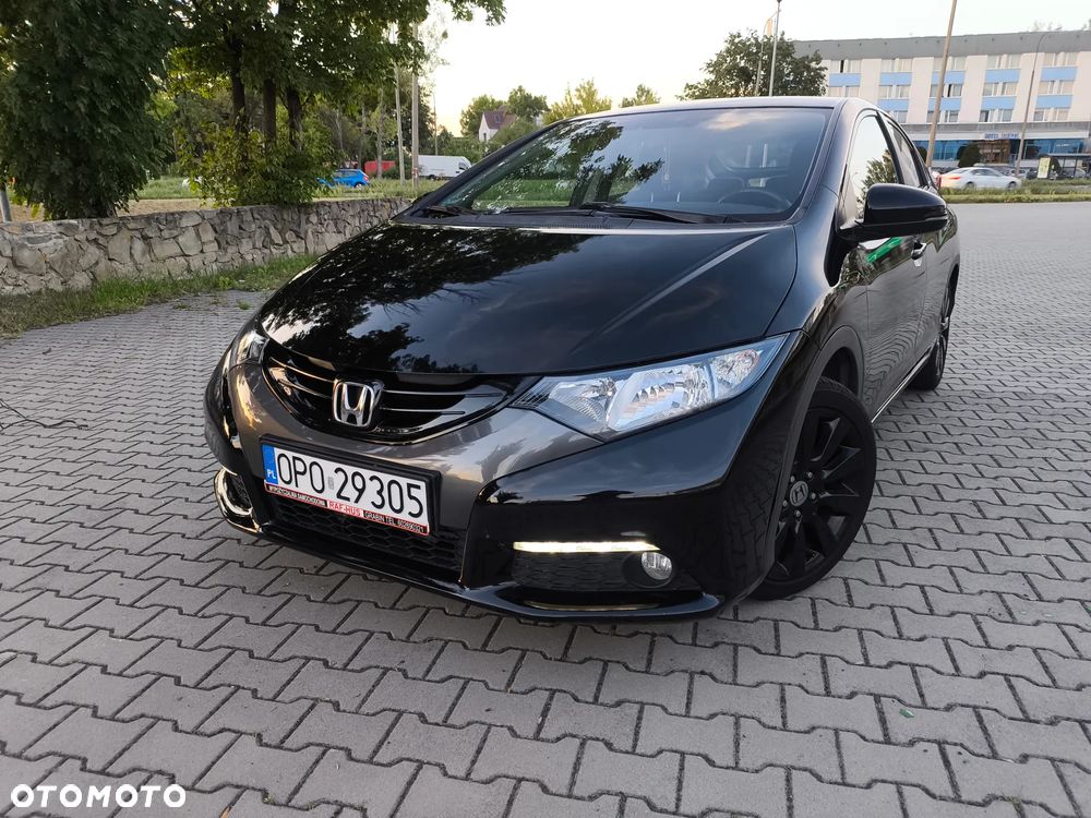 Honda Civic 1.4 i-VTEC Comfort - 1