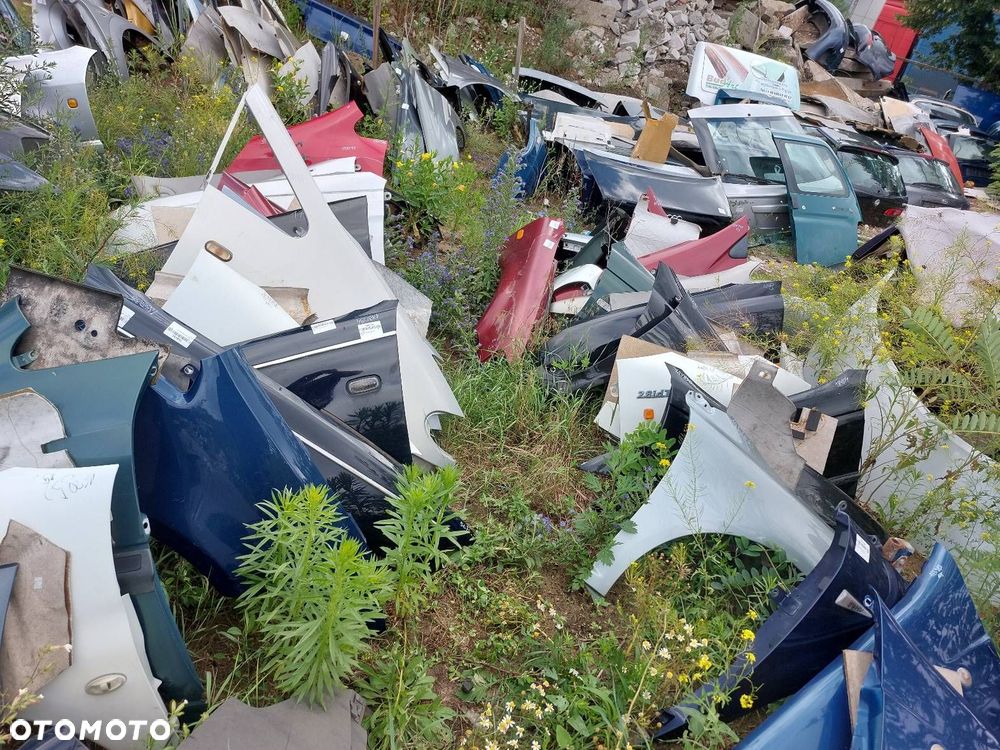 BŁOTNIK PRAWY PRZÓD ROVER 75 I - 6