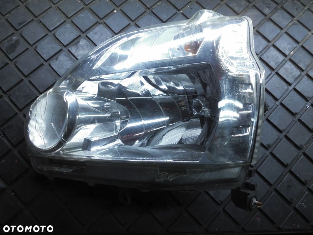 REFLEKTOR LEWY LAMPA PRZÓD NISSAN X-TRAIL 2 II - 1