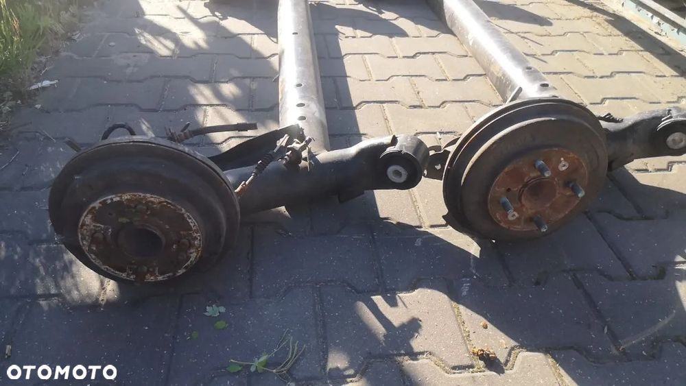 BELKA ZAWIESZENIA TYLNEGO TYŁ MAZDA 2