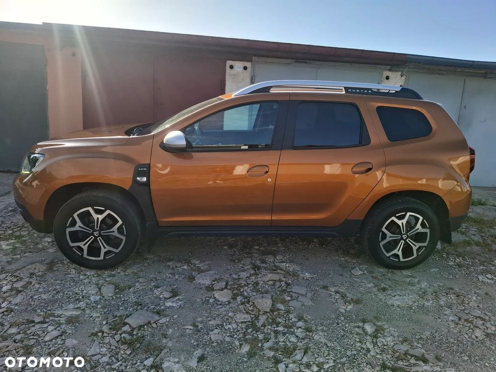 Dacia Duster 1.6 SCe Prestige 4WD - 13