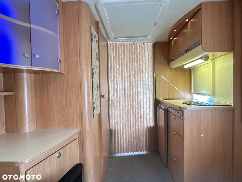 Adria ADORA 472 LU z napędem i markizą ze ścianami.  DMC 1300 - 19