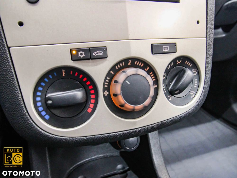 Opel Corsa 1.2 16V Enjoy - 18