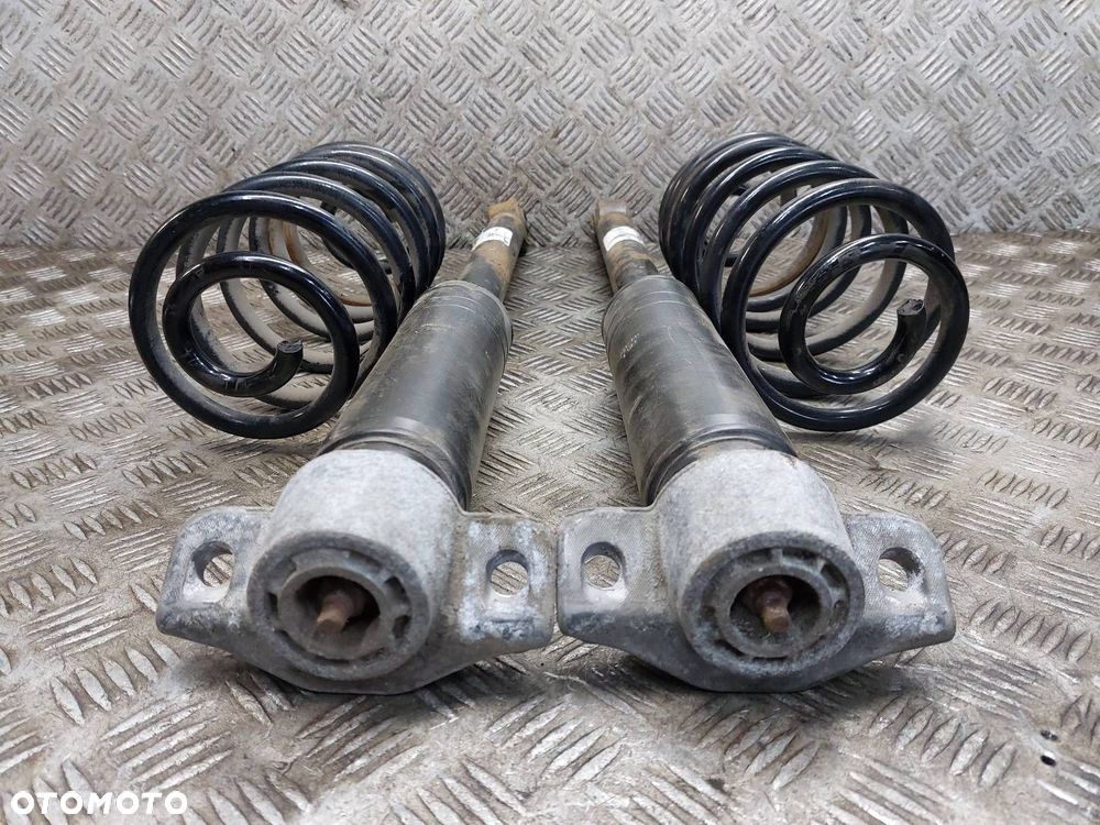 AMORTYZATORY + SPRĘŻYNY TYŁ KOMPLET OPEL ASTRA J 13279267 KYB RA6232 - 2