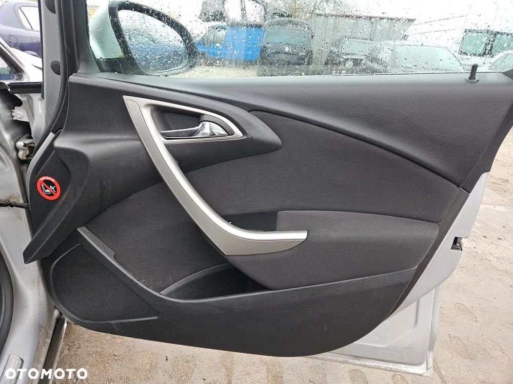 Boczek drzwi lewy prawy przedni Opel Astra J 2010r Z176 5d hatchback Europa - 2