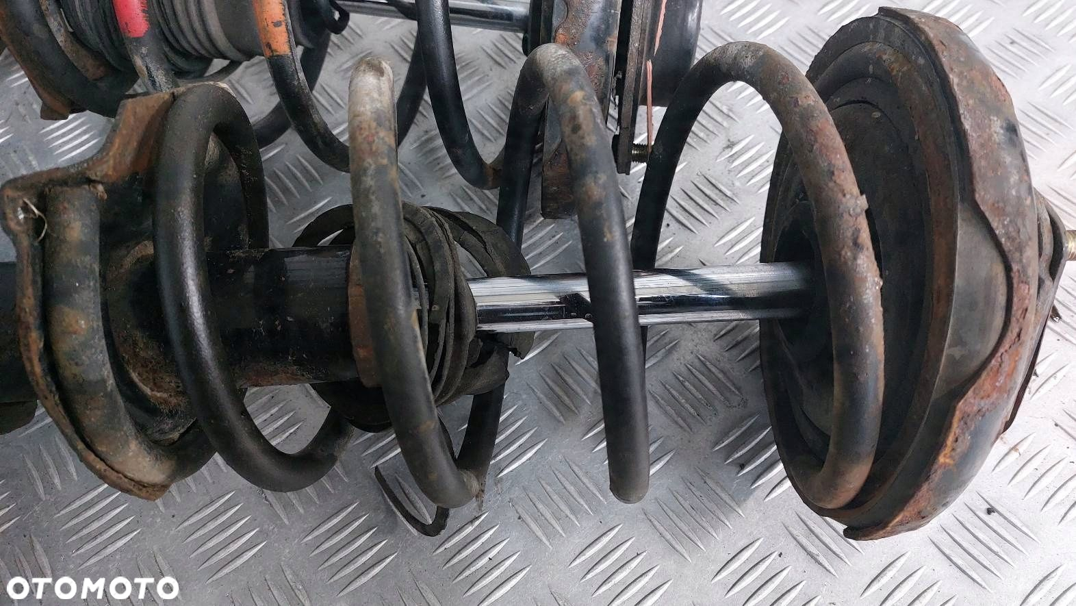 AMORTYZATOR SPRĘŻYNA ZWROTNICA LEWY  PRAWY PRZÓD NISSAN PRIMERA P12 - 2