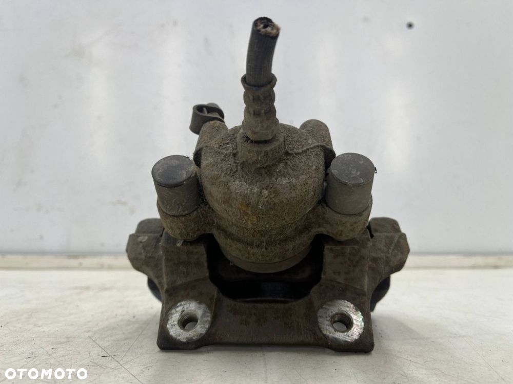 Zacisk hamulcowy BMW E81 E82 X1 E84 E90 E91 E92 E93 lewy tylny jarzmo lewy tył na tarcze 300 mm. - 6