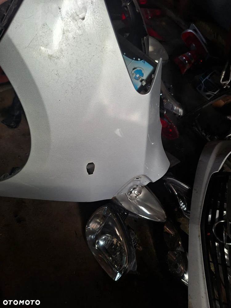 lewy błotnik yaris II 1E7 srebrny poznan - 1