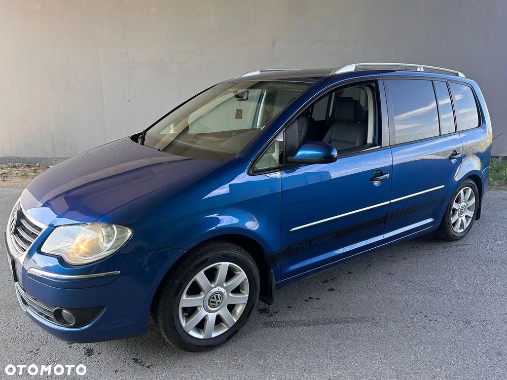 Volkswagen Touran 1.9 TDI Highline DSG - 1
