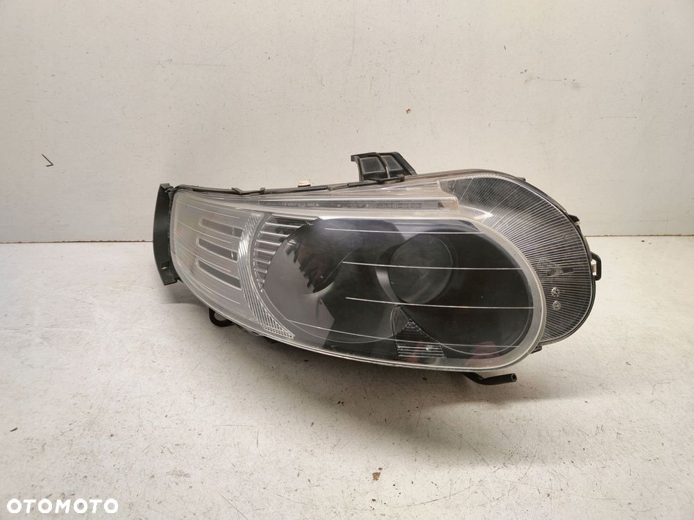 saab 9-5 lift xenon prawy - 1