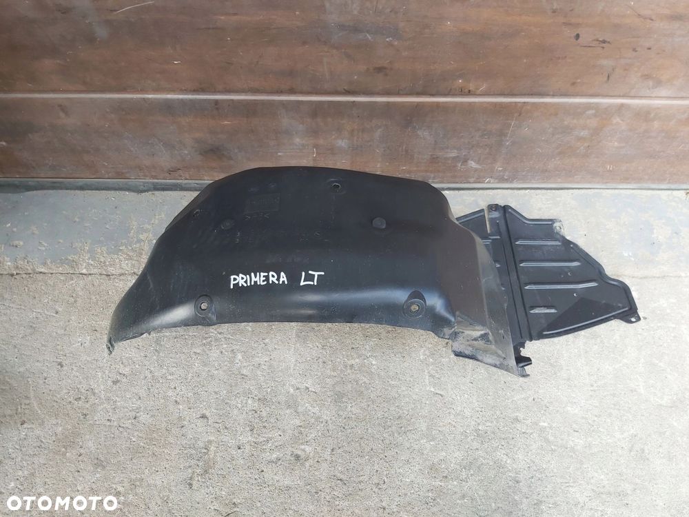 Nissan Primera P12 Nadkole lewy tył 76741-AV600 - 1