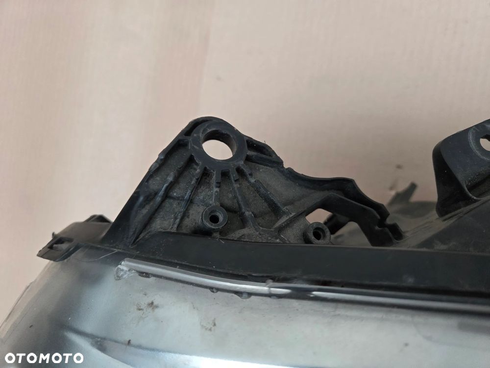 Lampa przednia lewa Peugeot 208 przed LIFT  9802221880 - 7